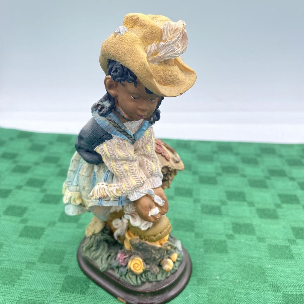 Vintage African American Girl figurine Tying Shoe On Log Very Detailed 6.25” HT